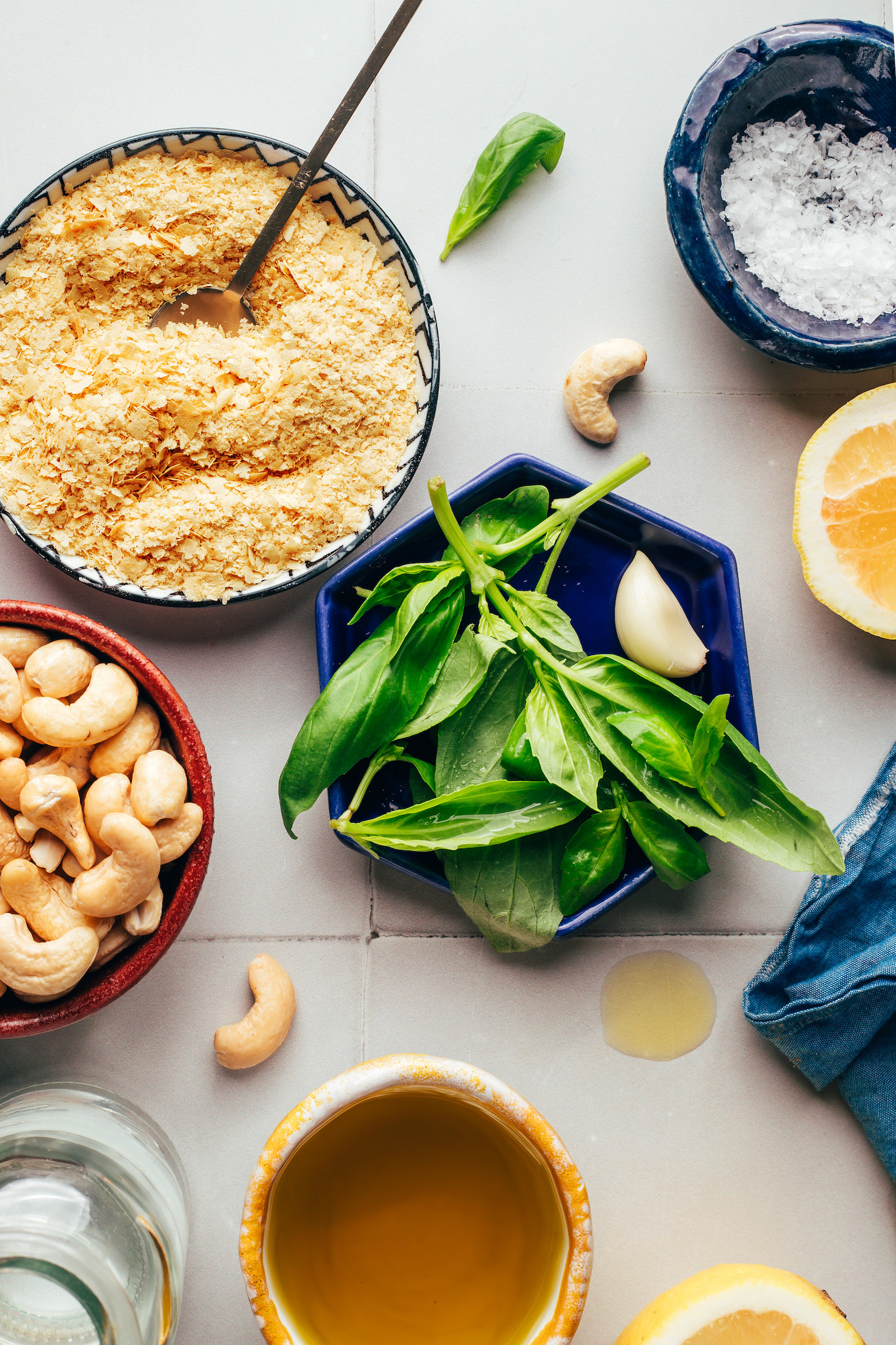 Nutritional yeast, cashews, water, olive oil, lemons, garlic, fresh basil, and sea salt