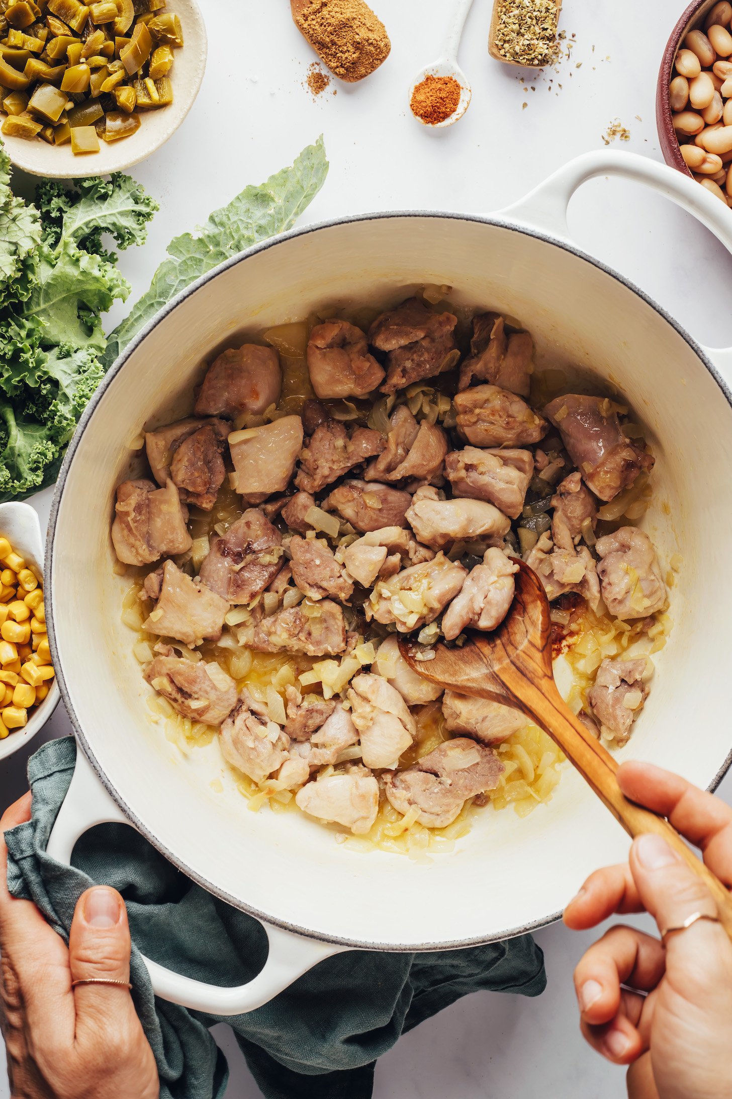 Sautéing cubed chicken thighs in a Dutch oven