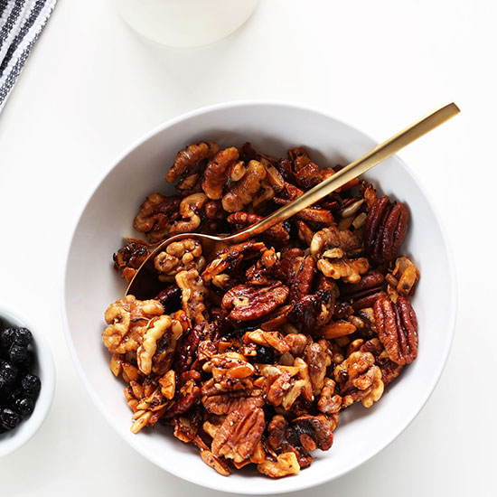 Gold spoon in a bowl of our Simple Grain-Free Granola recipe