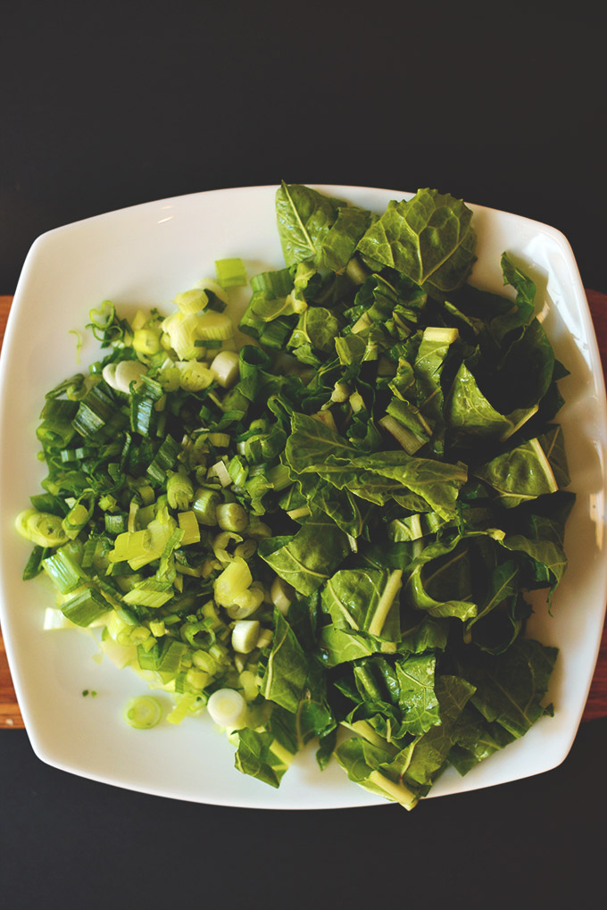 Plate of chopped green onion and chard 