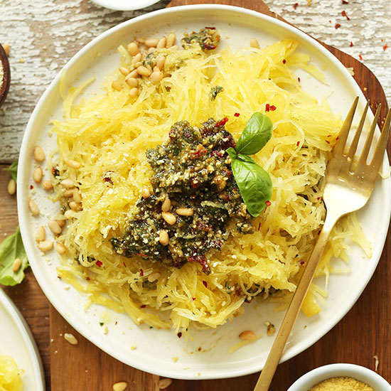 Top down shot of a big plate of Spaghetti Squash Pasta with Basil Pesto