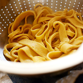 Homemade Pumpkin Pasta in a colander