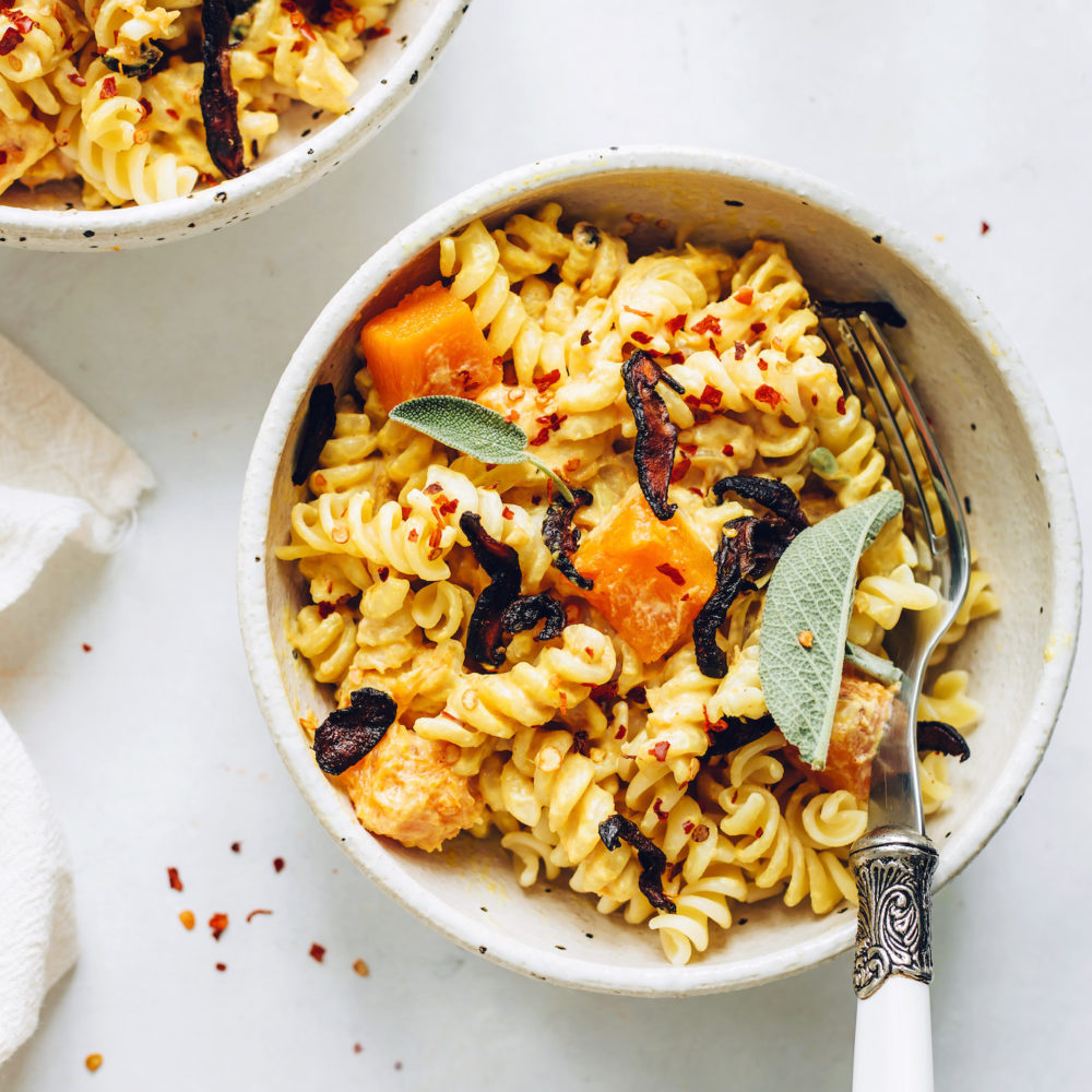 Bowl of gluten-free butternut squash pasta with shiitake bacon