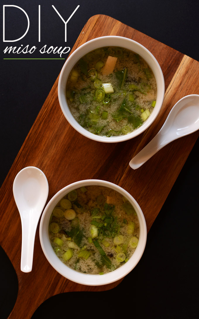 Cutting board with bowls of our simple miso soup recipe